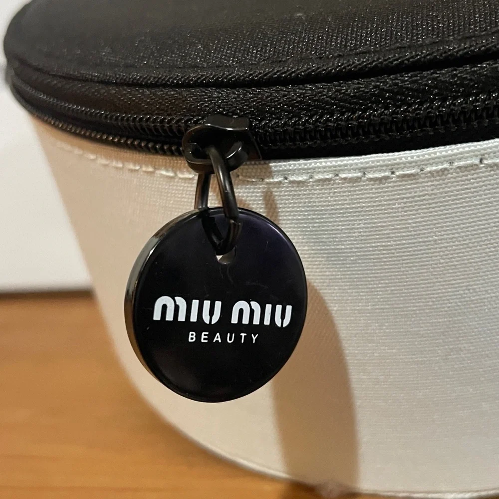 Miu Miu features branded